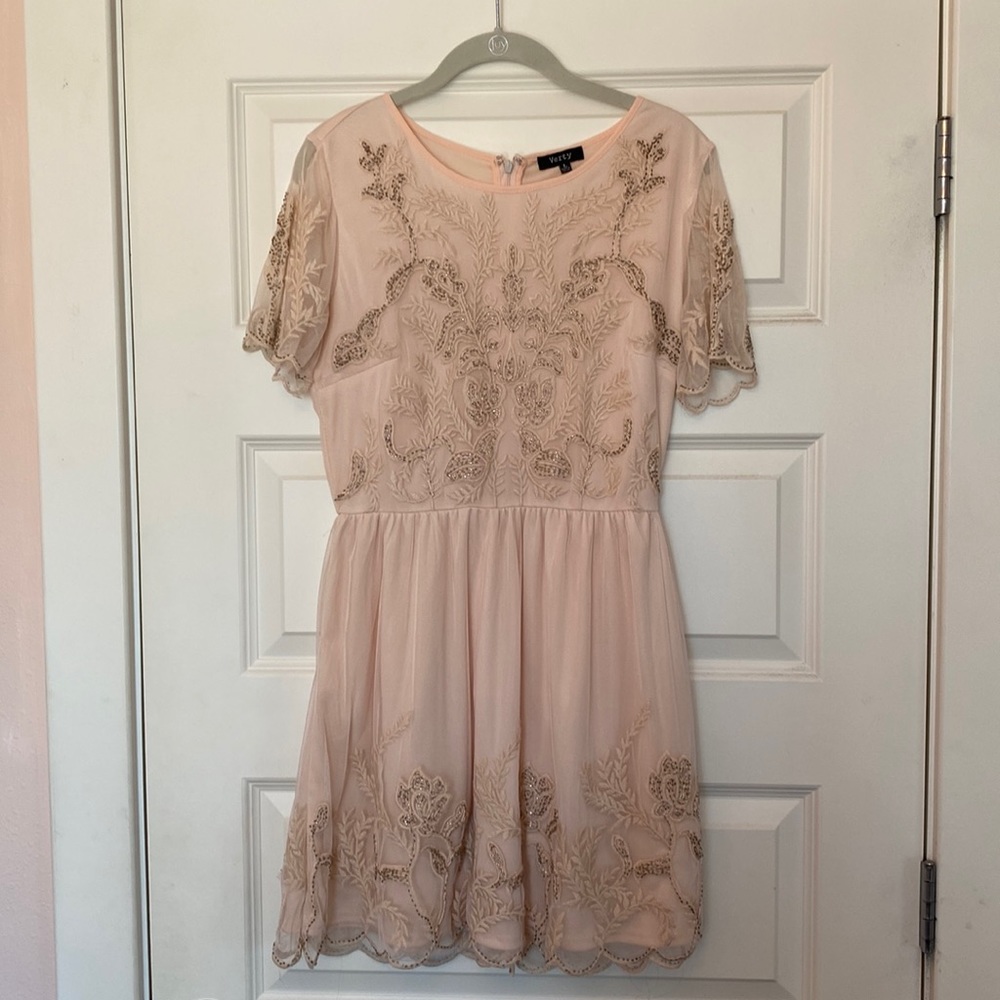 Blush pink dress. Comfortable and cute. Comes down to mid thigh.